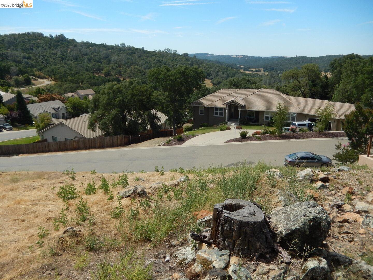 512 Crazy Horse Road Cameron Park, CA 95682 - Photo 10 of 18 a view of a garden with a area
