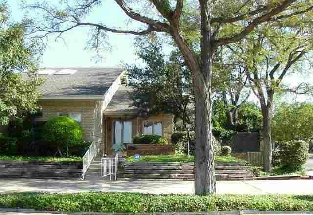 3202 59th Street Lubbock, TX 79413 - Photo 1 of 1 a front view of a house with garden