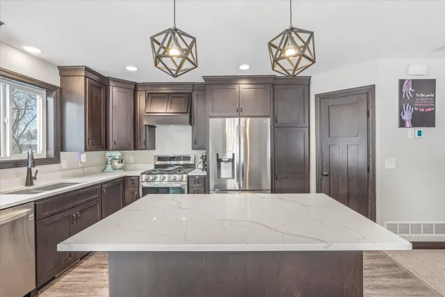 $424,900 | 409 105th Lane Northwest, Coon Rapids, MN 55448