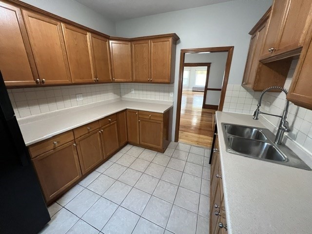 0 Lafayette Street, Unit 1 Fall River, MA 02723 - Photo 3 of 13 a kitchen with a sink and cabinets