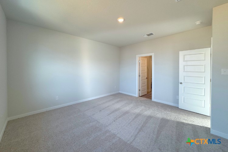 225 Firefox Way Jarrell, TX 76537 - Photo 4 of 11 an empty room with closet