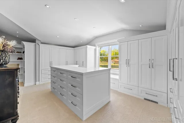 a view of cabinets and window