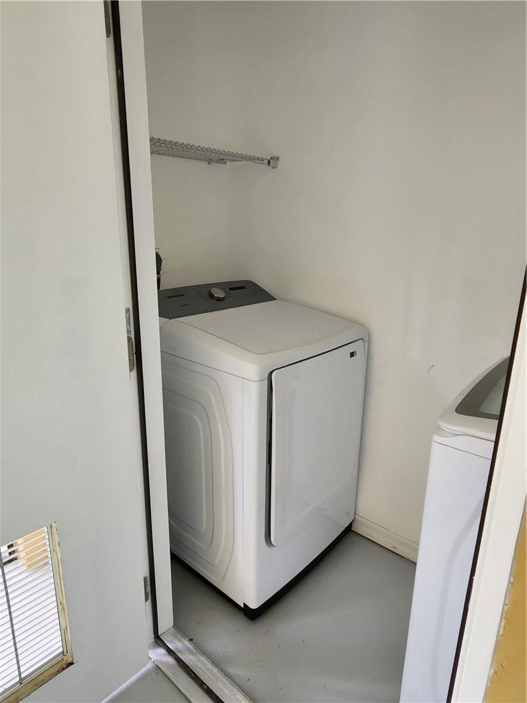 Undisclosed Address Pompano Beach, FL 33063 - Photo 15 of 30 a utility room with dryer and washer