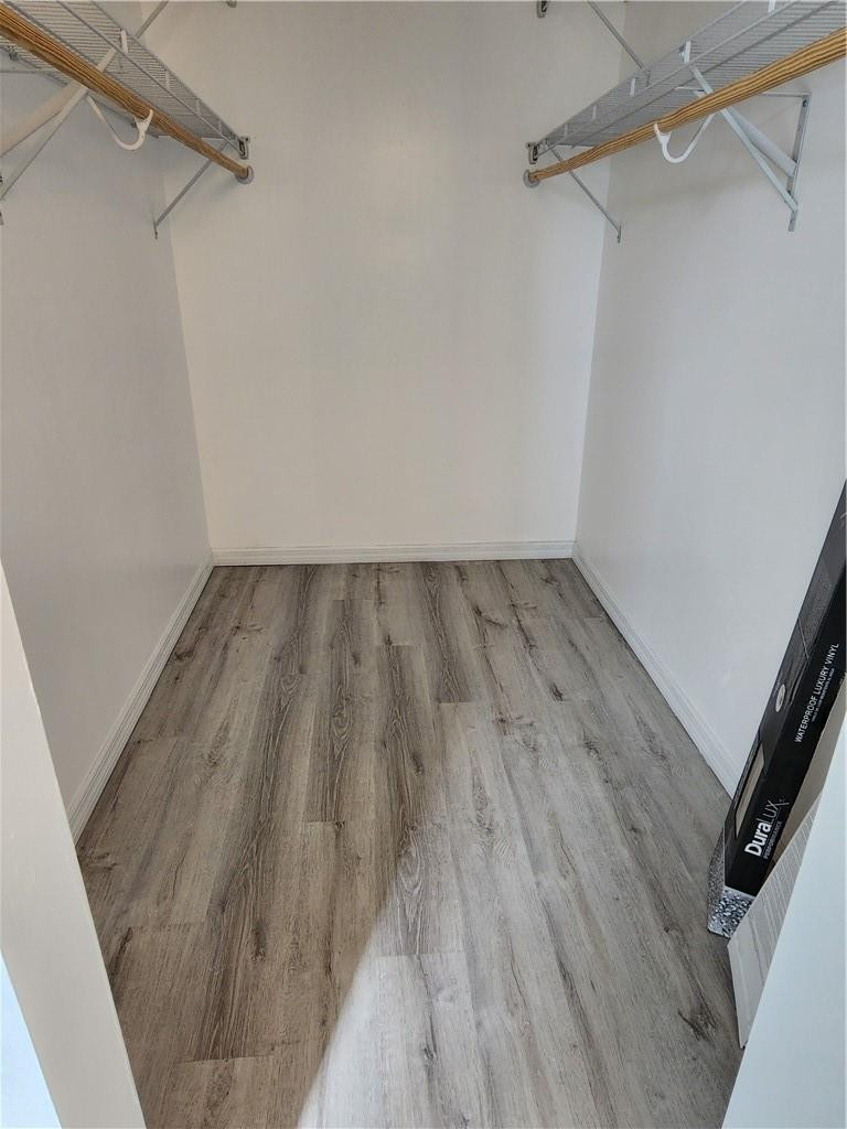 Undisclosed Address Pompano Beach, FL 33063 - Photo 22 of 30 a view of a room with wooden floor