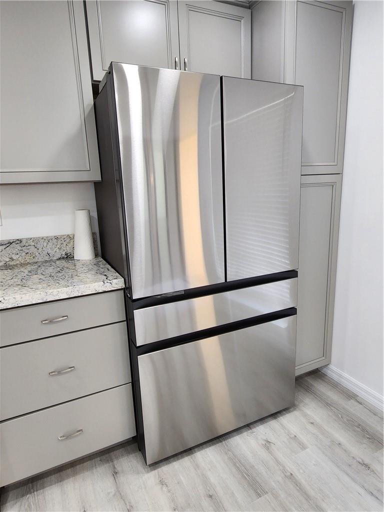 Undisclosed Address Pompano Beach, FL 33063 - Photo 24 of 30 a white refrigerator freezer sitting in a kitchen