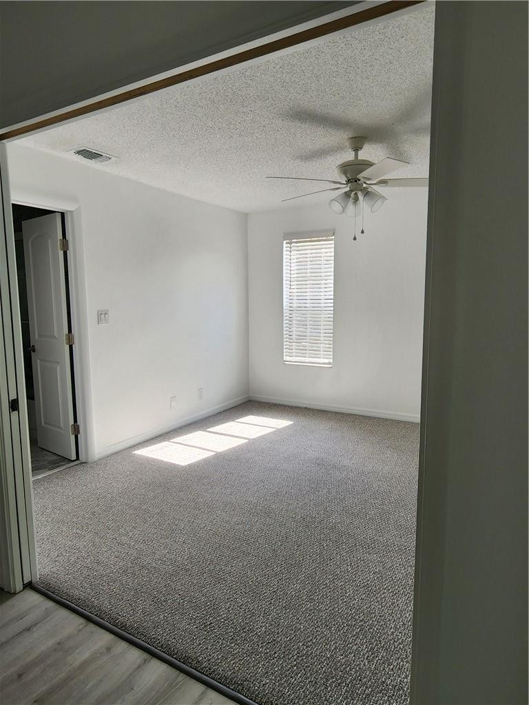 Undisclosed Address Pompano Beach, FL 33063 - Photo 9 of 30 an empty room with windows and closet