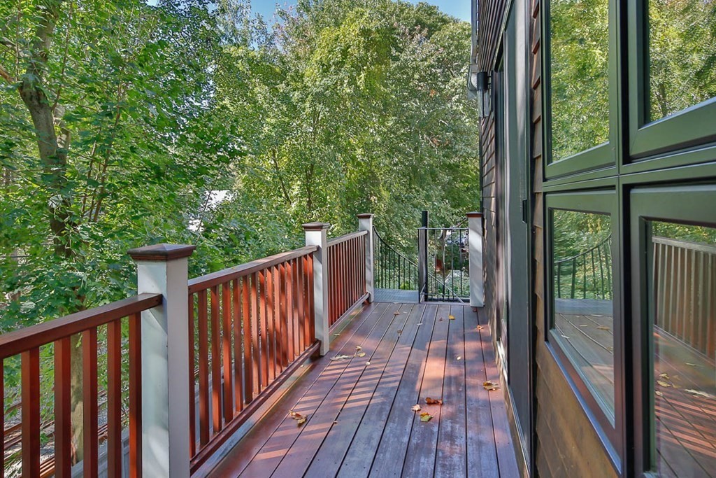 26 Beaconsfield Road, Unit 26 Brookline, MA 02445 - Photo 11 of 35 a view of balcony with wooden floor