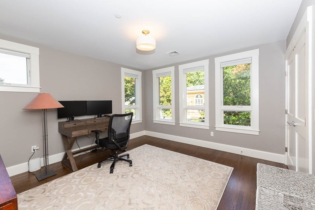 26 Beaconsfield Road, Unit 26 Brookline, MA 02445 - Photo 21 of 35 a workspace with furniture and a window