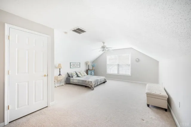 a view of a bathroom from a hallway