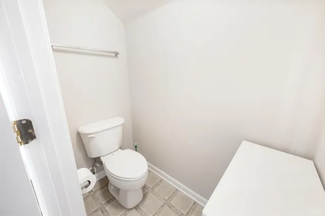 a front view of a house with yard and street view