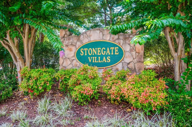 a view of a a dining room with furniture window and wooden floor