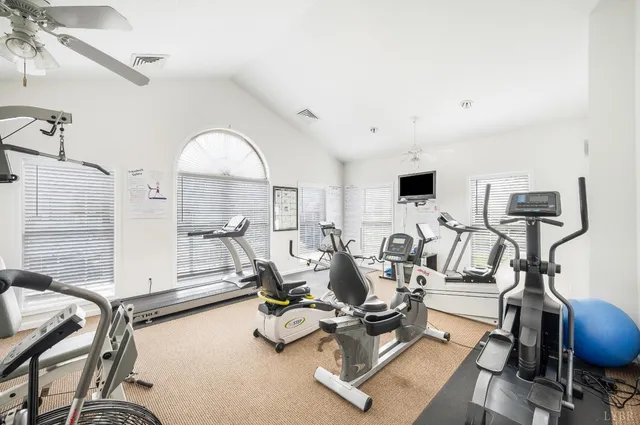 a view of front of house with a yard