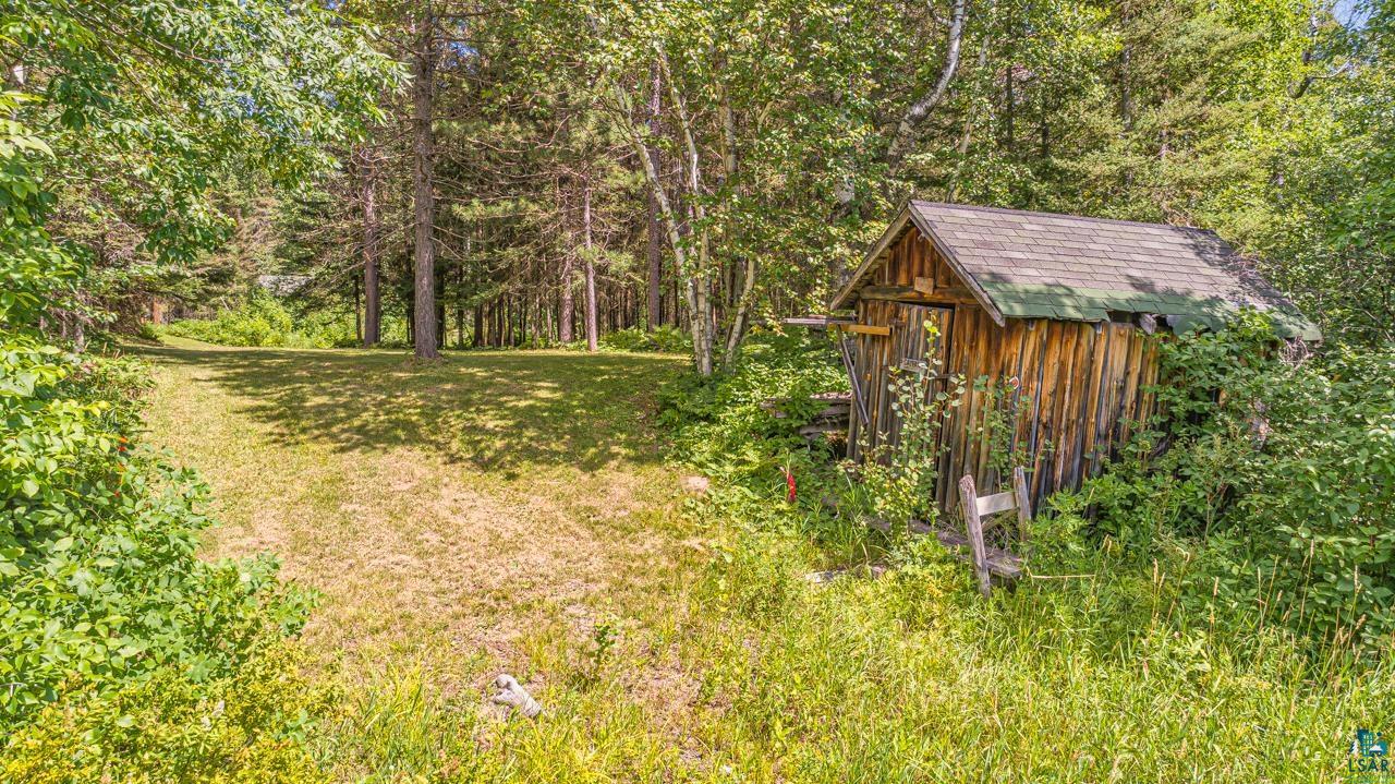 14057 Mikana Road Ely, MN 55731 - Photo 10 of 11 View of yard with a storage shed