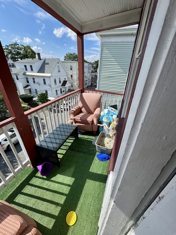 57-59 Walnut Street Lawrence, MA 01841 - Photo 20 of 23 a view of a two chairs in the roof deck