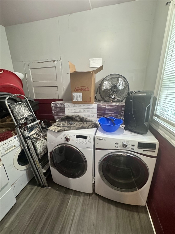 57-59 Walnut Street Lawrence, MA 01841 - Photo 21 of 23 a utility room with dryer and washer