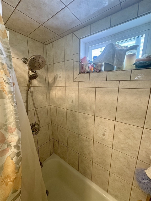 57-59 Walnut Street Lawrence, MA 01841 - Photo 9 of 23 a bathroom with a shower