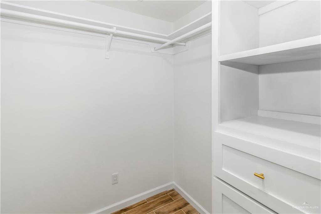 2309 Victoriano Street Weslaco, TX 78596 - Photo 12 of 15 a view of an empty walk in closet