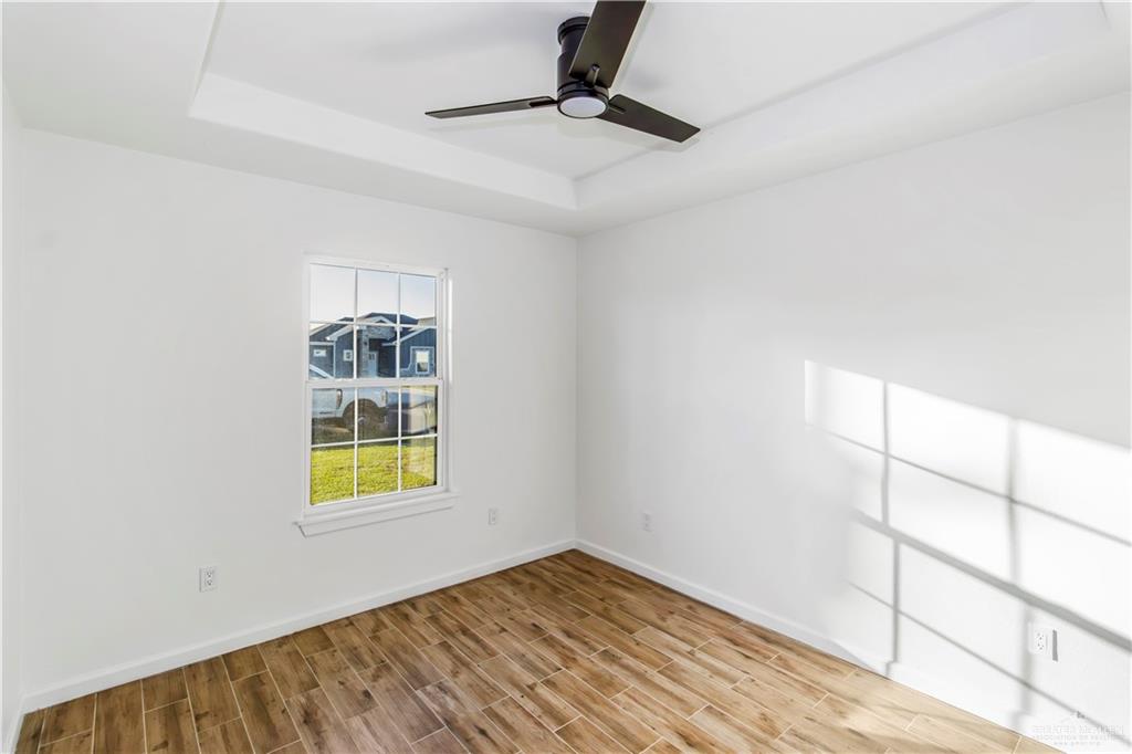 2309 Victoriano Street Weslaco, TX 78596 - Photo 13 of 15 a view of empty room with windows