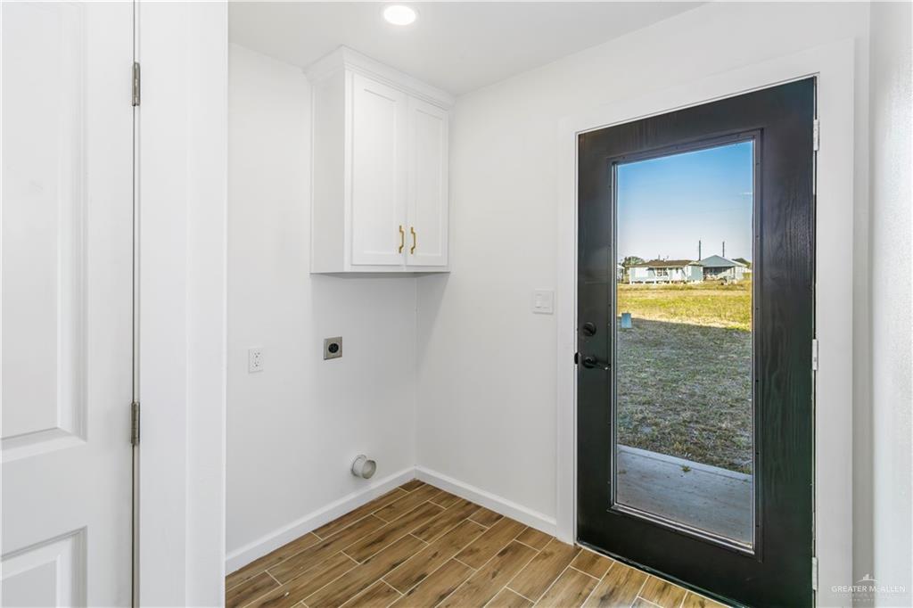 2309 Victoriano Street Weslaco, TX 78596 - Photo 9 of 15 a view of walk in closet with wooden floor