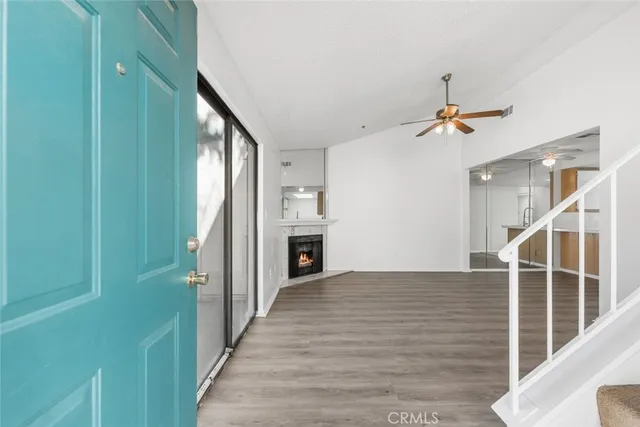 a view of a hallway view with staircase