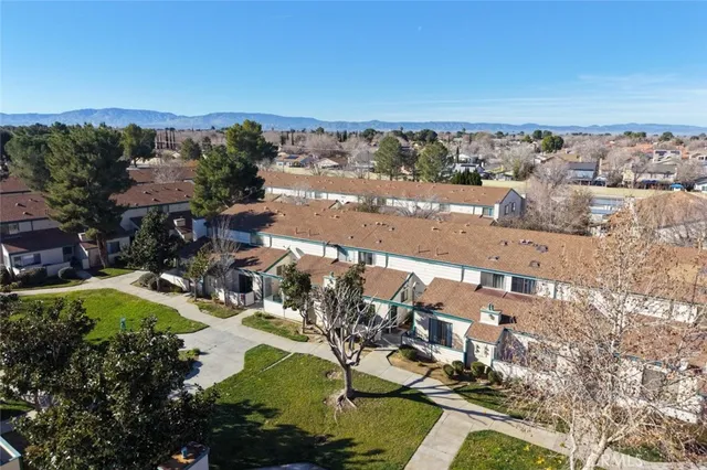 aerial view of a house with a lake view