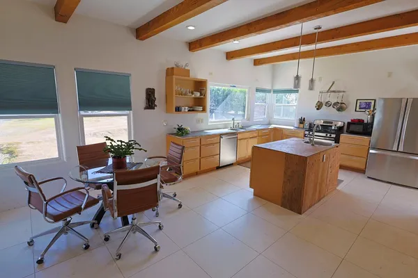 a kitchen with granite countertop lots of counter top space