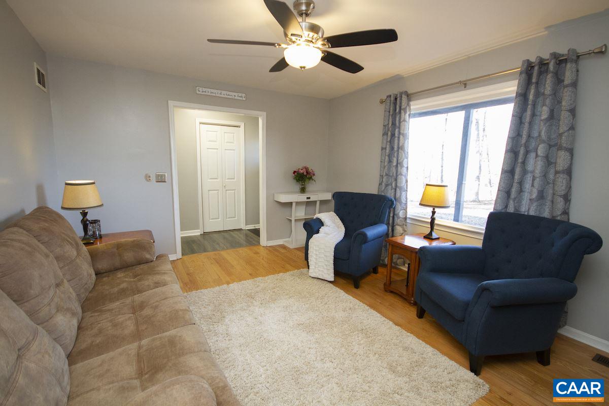 116 Tulip Road Ruckersville, VA 22968 - Photo 5 of 19 a bedroom with furniture and a large window