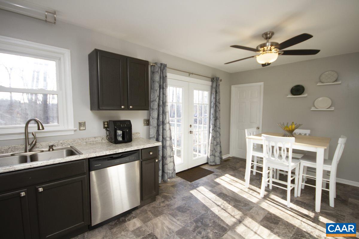 116 Tulip Road Ruckersville, VA 22968 - Photo 8 of 19 a kitchen with a sink cabinets and window