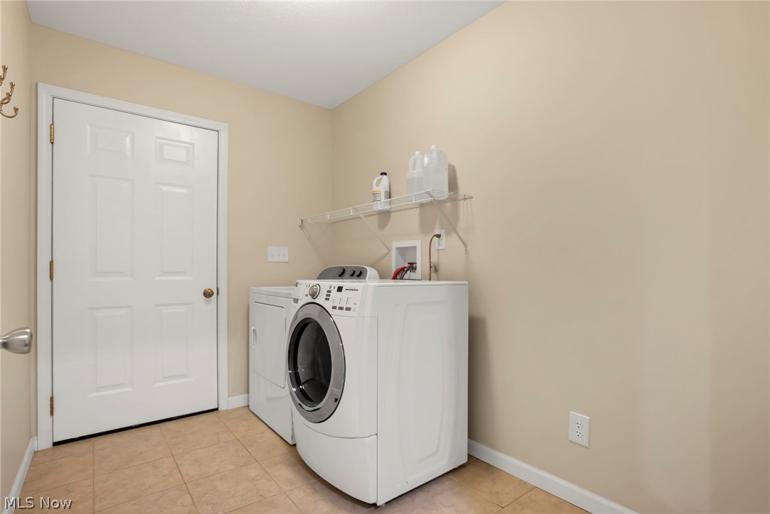 14953 King Road Howard, OH 43028 - Photo 11 of 40 Laundry room featuring included washer and dryer