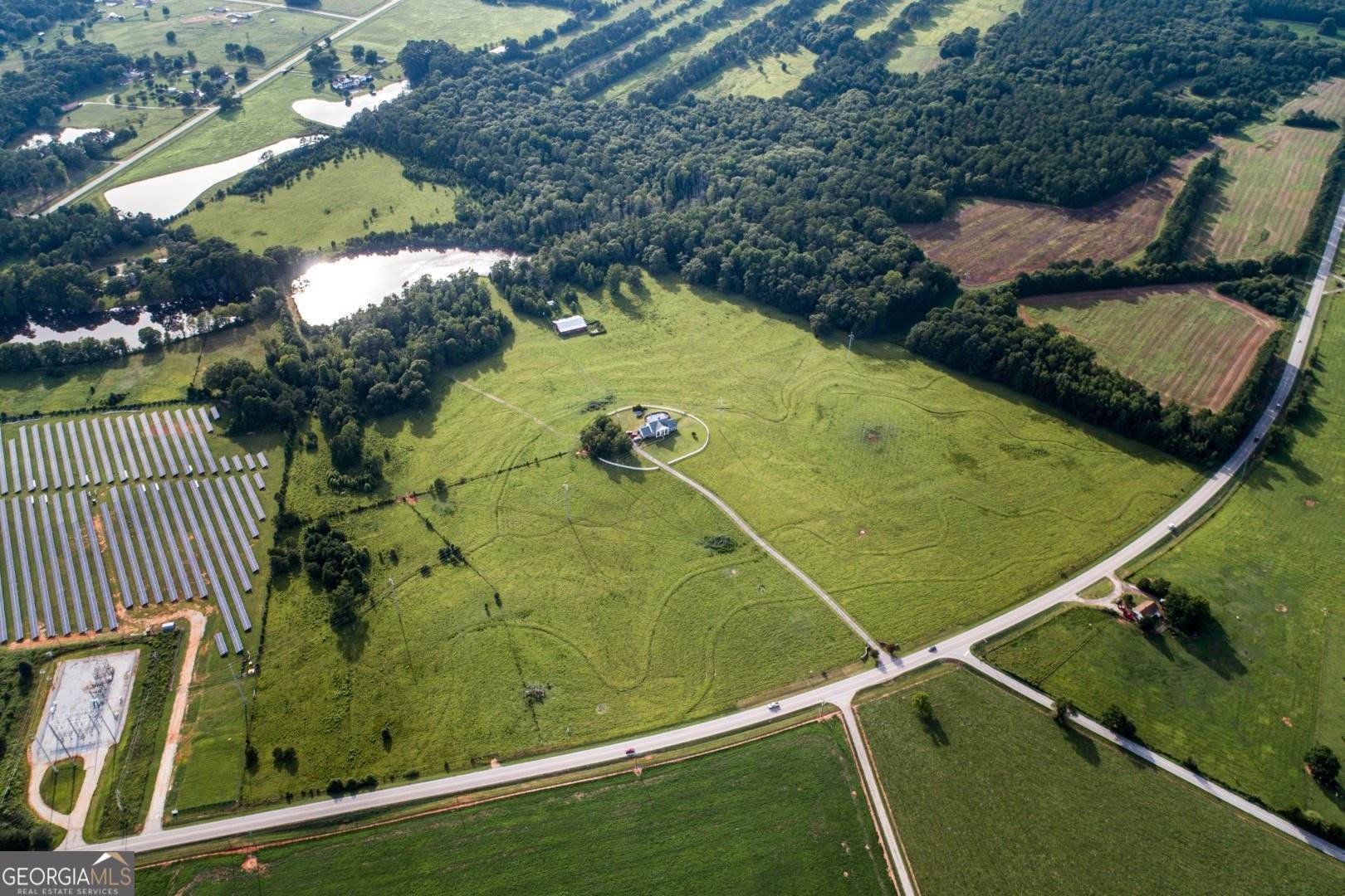 1530 State Highway 11 Covington, GA 30014 - Photo 12 of 32 a view of a backyard
