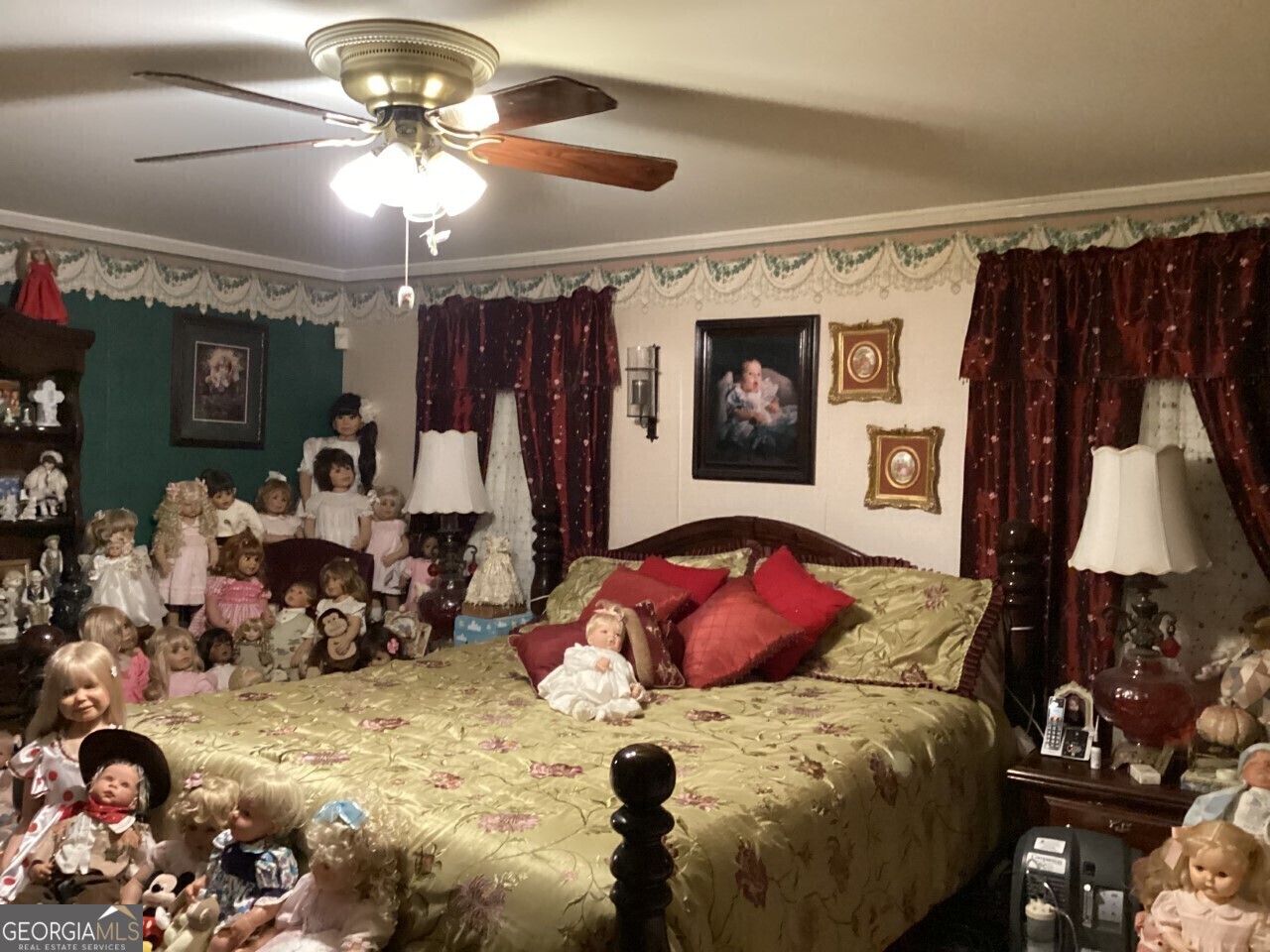 1530 State Highway 11 Covington, GA 30014 - Photo 30 of 32 a bedroom with a bed mirror and on the dresser