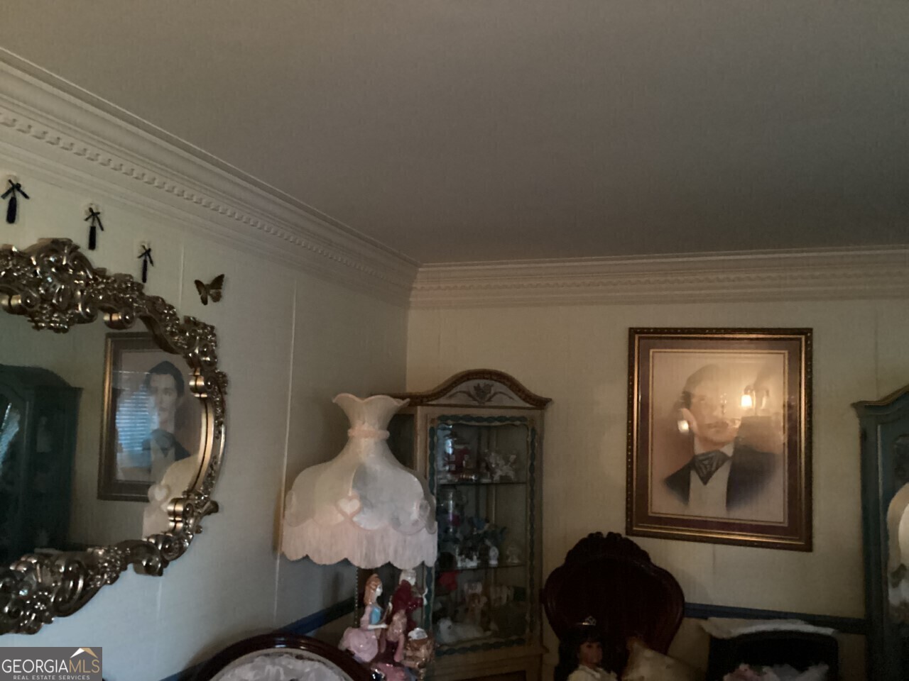 1530 State Highway 11 Covington, GA 30014 - Photo 32 of 32 a living room with furniture and a mirror