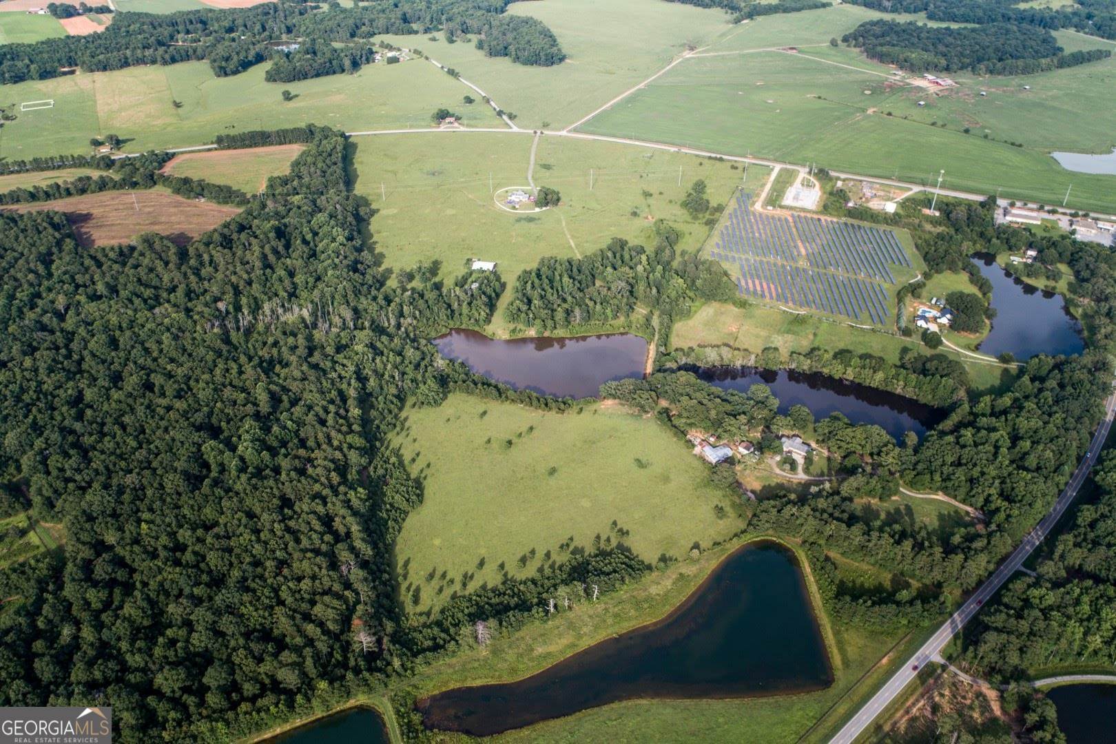 1530 State Highway 11 Covington, GA 30014 - Photo 8 of 32 an aerial view of a residential houses with outdoor space