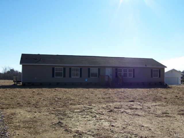 4549 Brantley Road Zebulon, NC 27597 - Photo 1 of 7 a view of a house with a yard