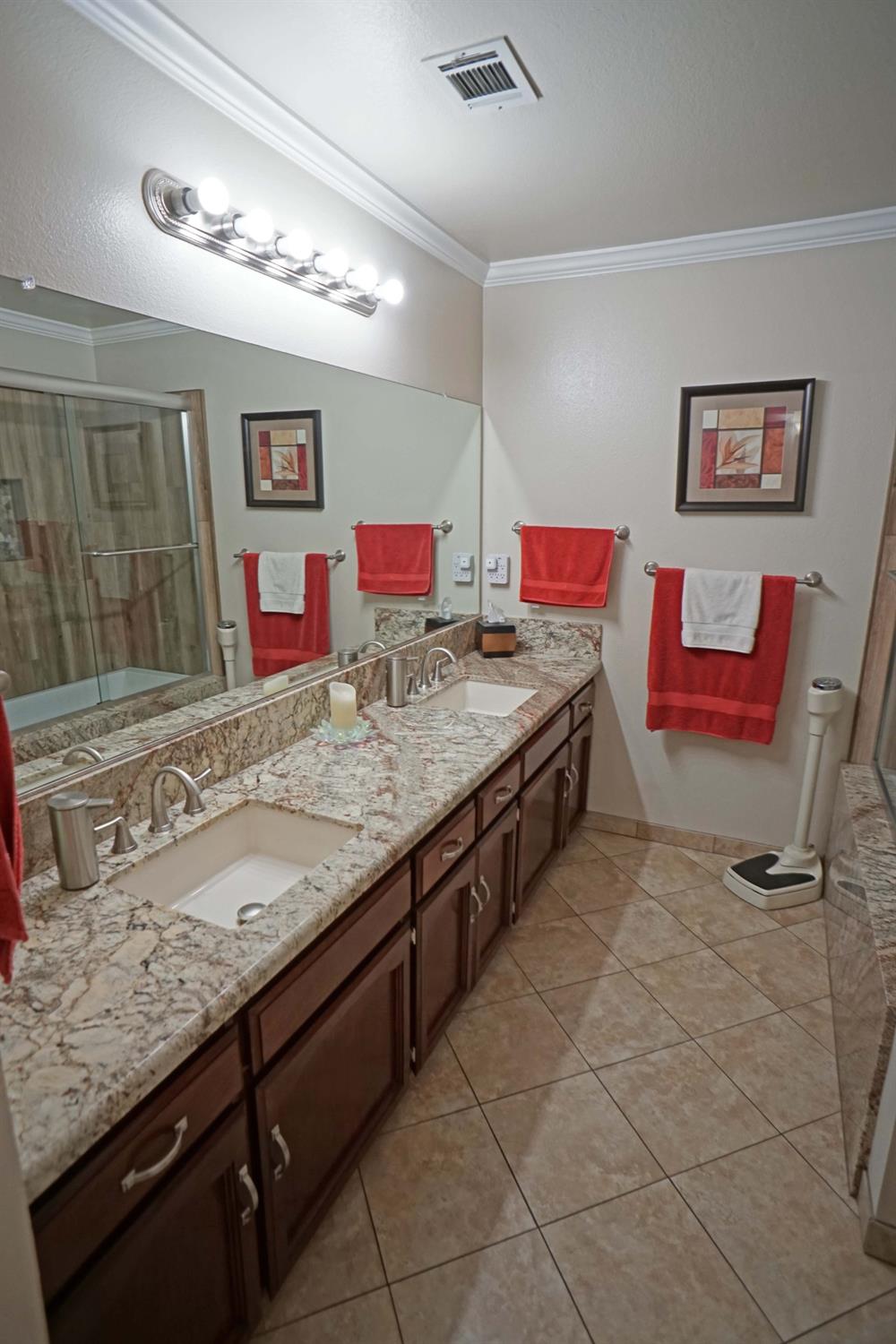2197 Polson Avenue Clovis, CA 93611 - Photo 22 of 42 a kitchen with stainless steel appliances granite countertop a sink and cabinets