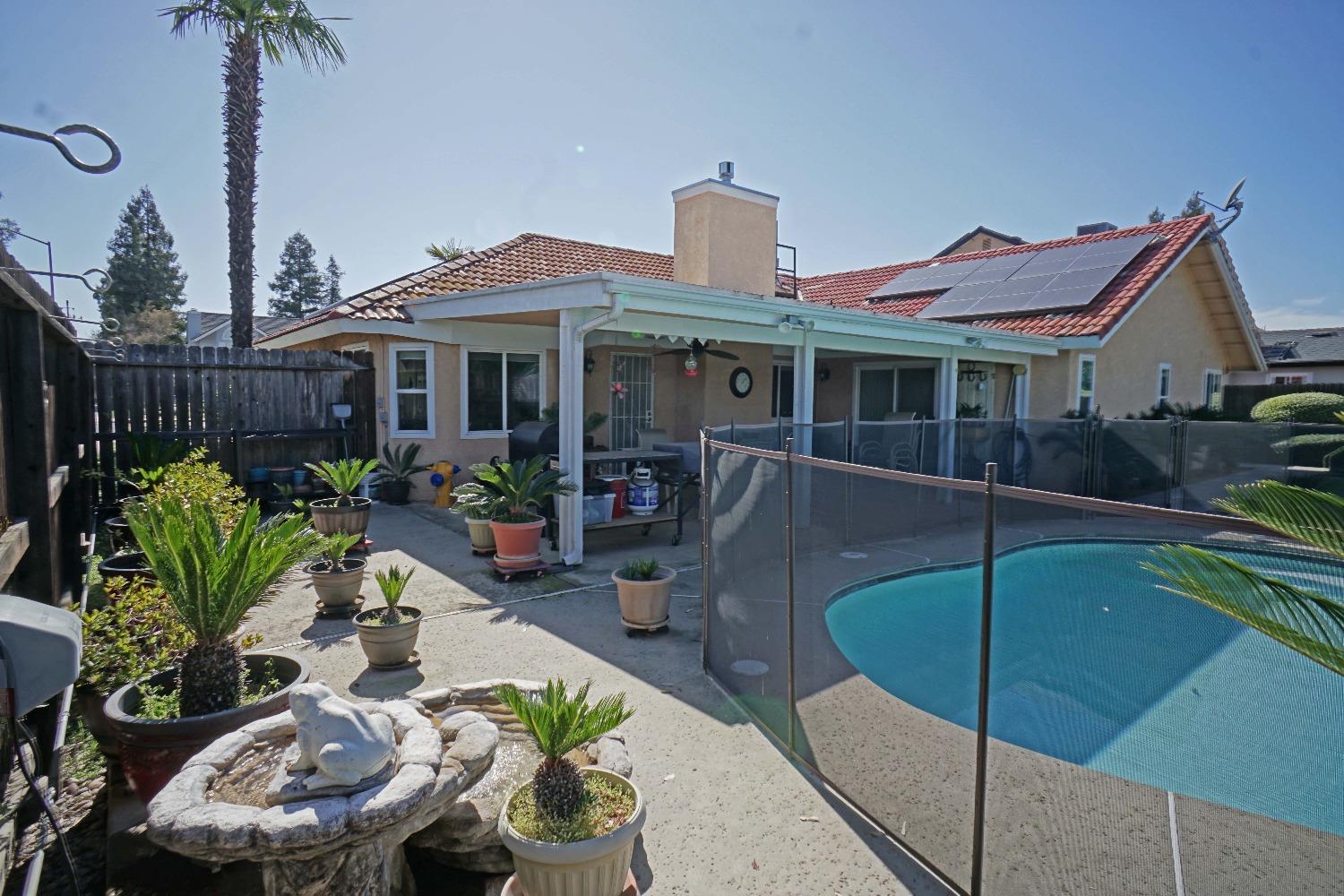 2197 Polson Avenue Clovis, CA 93611 - Photo 35 of 42 a front view of a house with garden