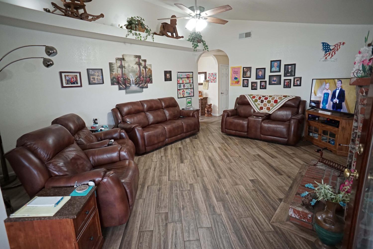 2197 Polson Avenue Clovis, CA 93611 - Photo 6 of 42 a living room with furniture and a flat screen tv