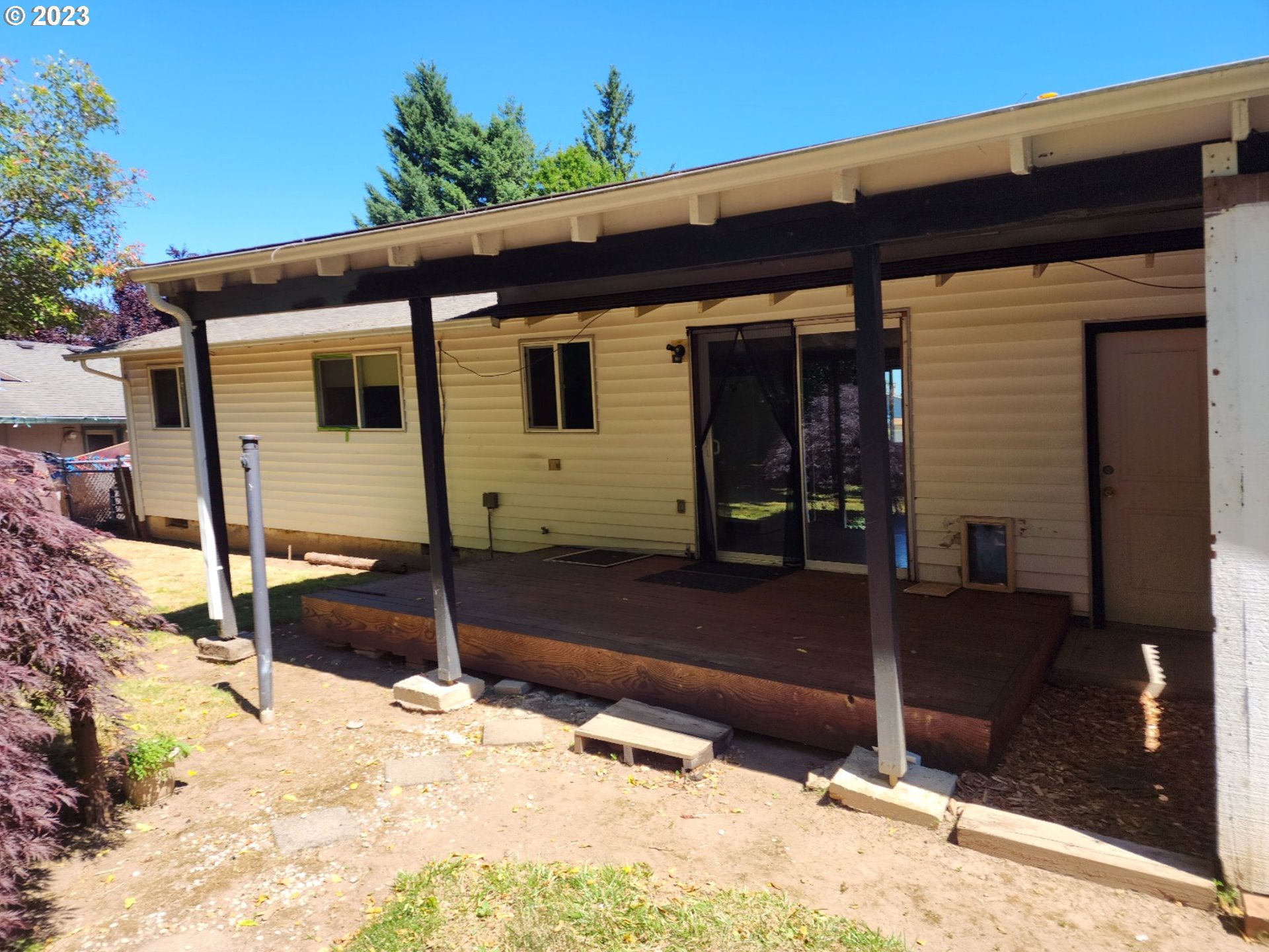 20732 Southeast Main Drive Gresham, OR 97030 - Photo 12 of 27 a front view of a house with a yard