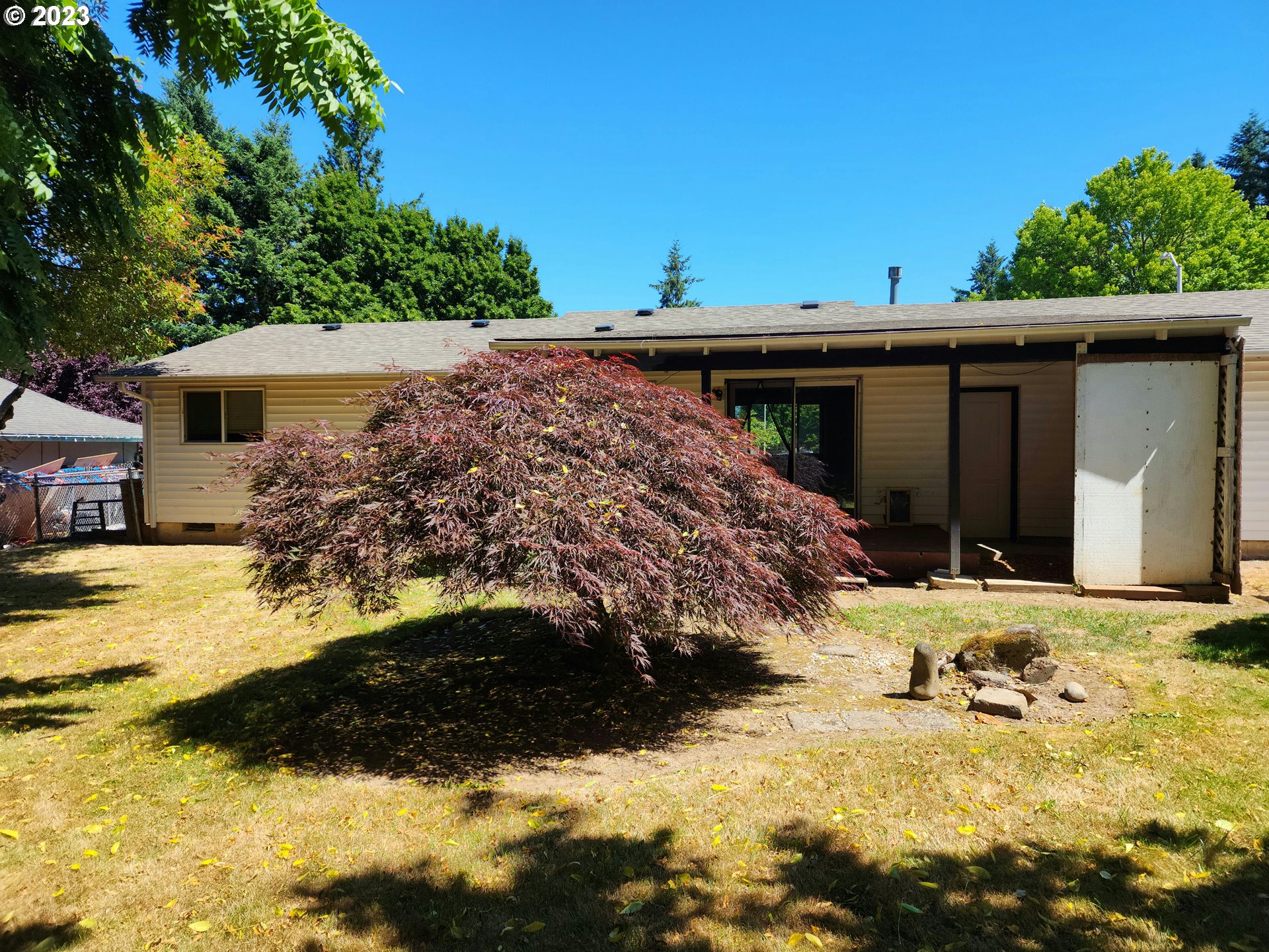 20732 Southeast Main Drive Gresham, OR 97030 - Photo 14 of 27 a view of a house with a snow in the yard