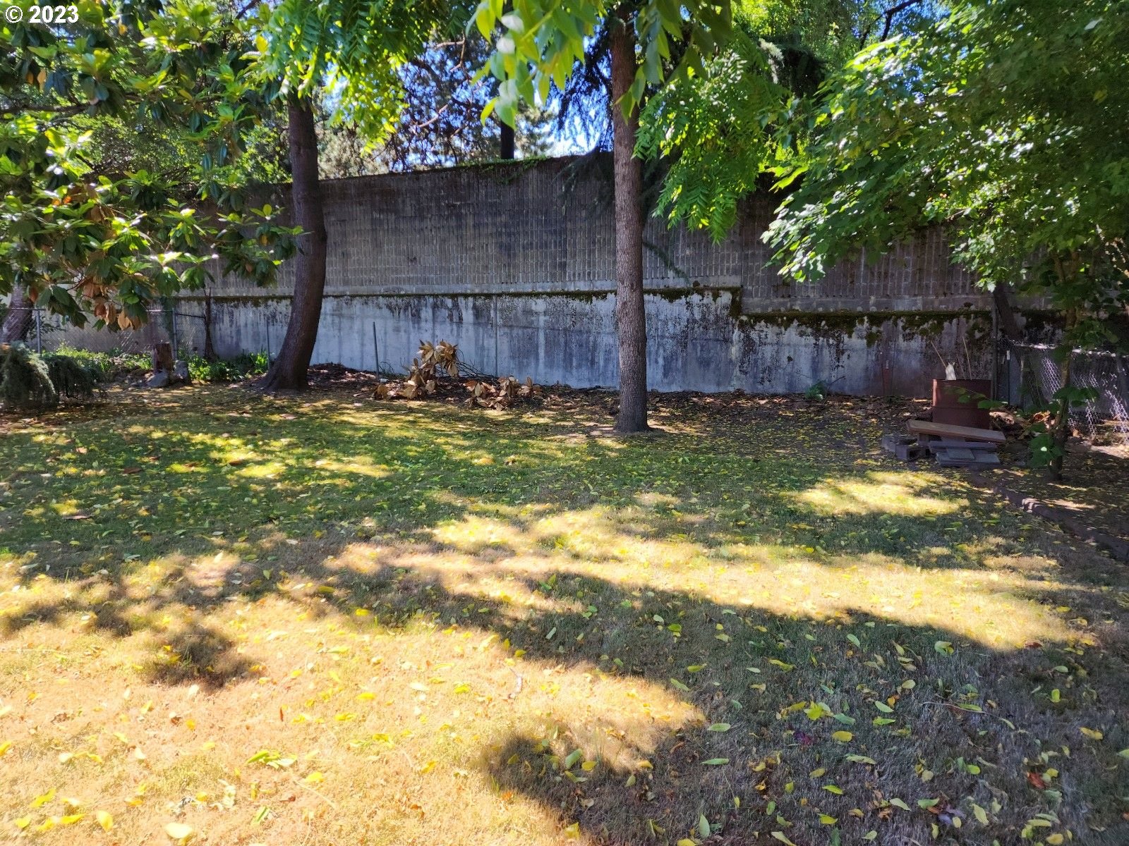 20732 Southeast Main Drive Gresham, OR 97030 - Photo 17 of 27 a view of a swimming pool with a patio and a yard