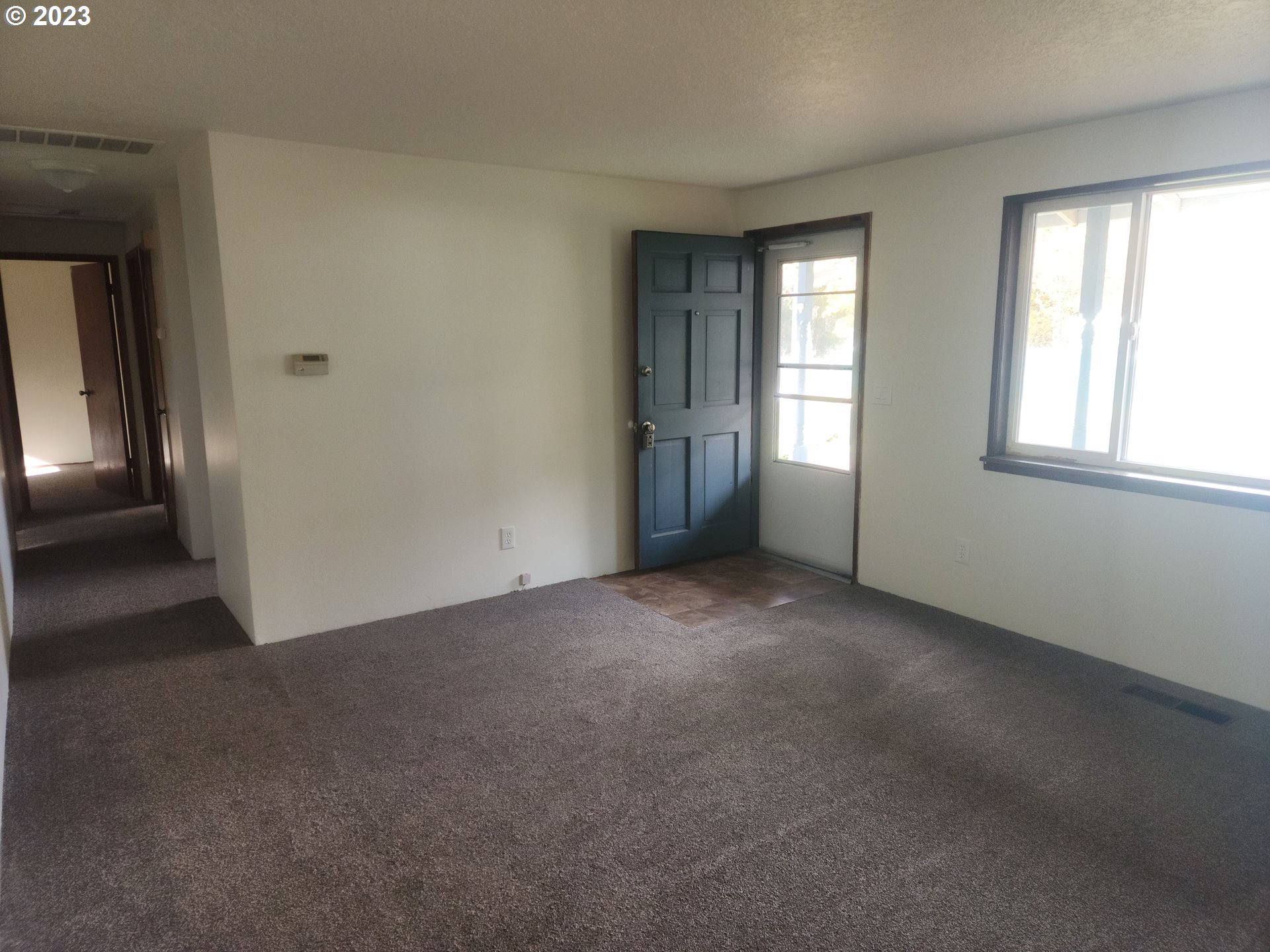 20732 Southeast Main Drive Gresham, OR 97030 - Photo 21 of 27 an empty room with windows