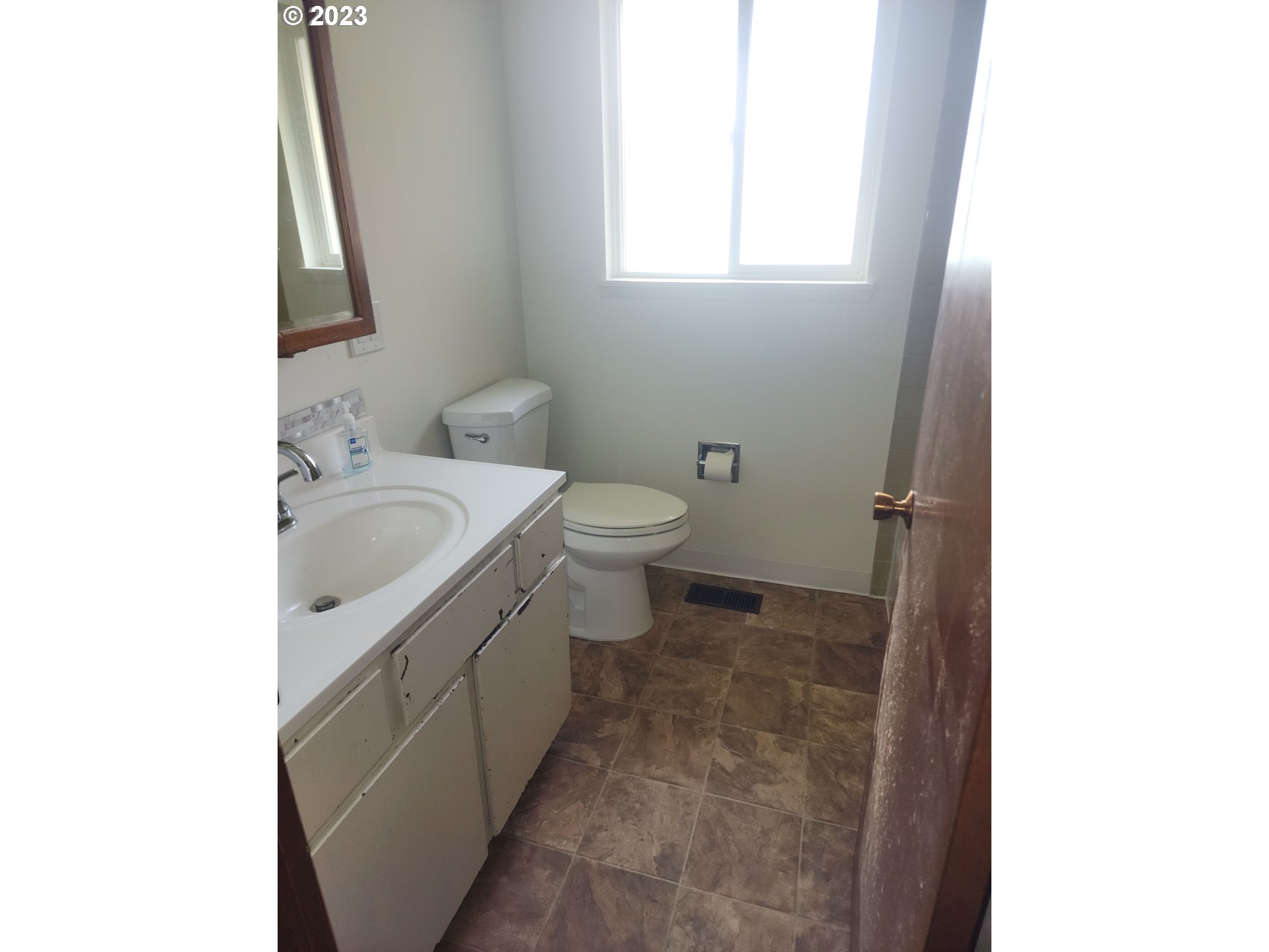 20732 Southeast Main Drive Gresham, OR 97030 - Photo 27 of 27 a bathroom with a sink and a toilet