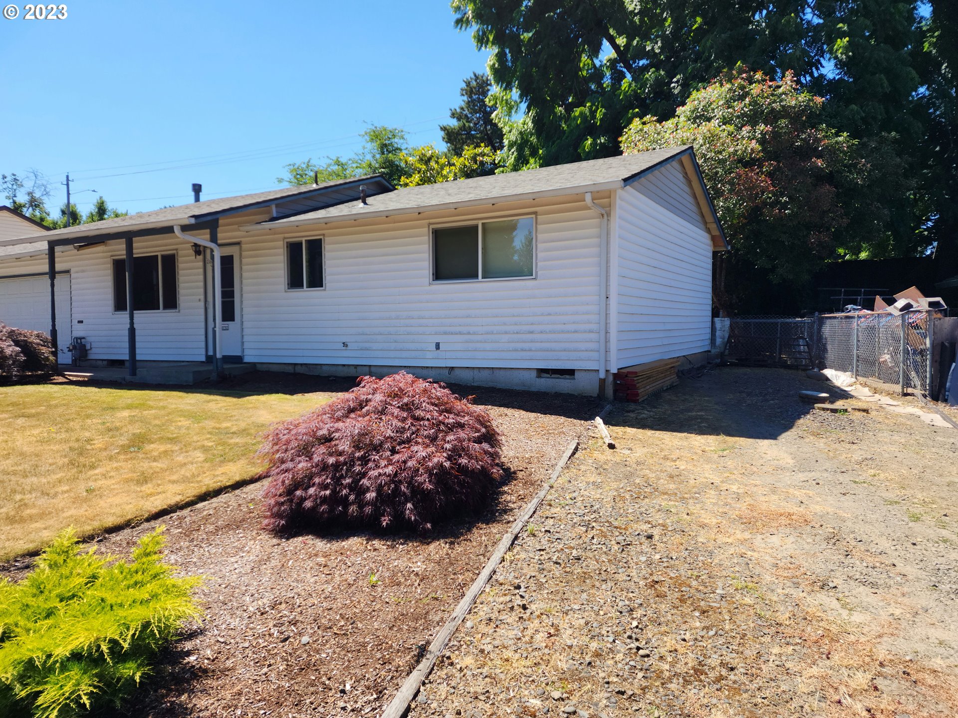 20732 Southeast Main Drive Gresham, OR 97030 - Photo 7 of 27 a view of a backyard of the house