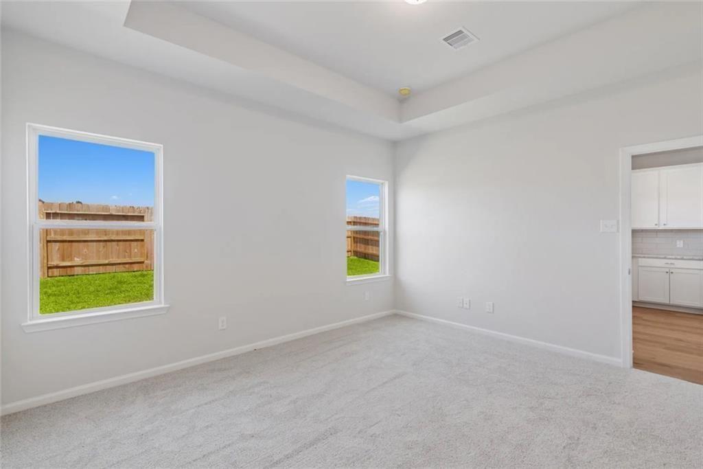 406 Fair Oak Lane Calhoun, GA 30701 - Photo 10 of 13 a view of an empty room with a window