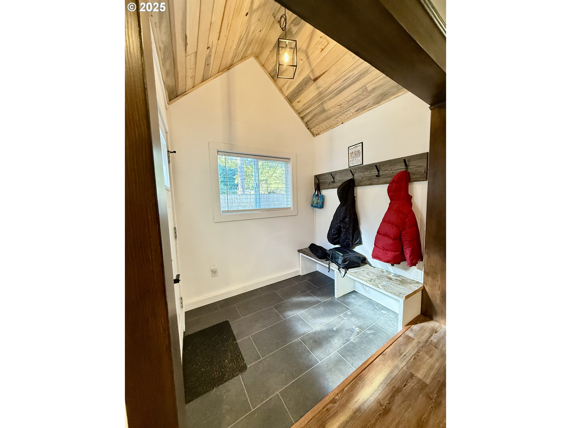 35349 Blitz Lane Blodgett, OR 97326 - Photo 11 of 47 a view of a room with wooden floor and windows