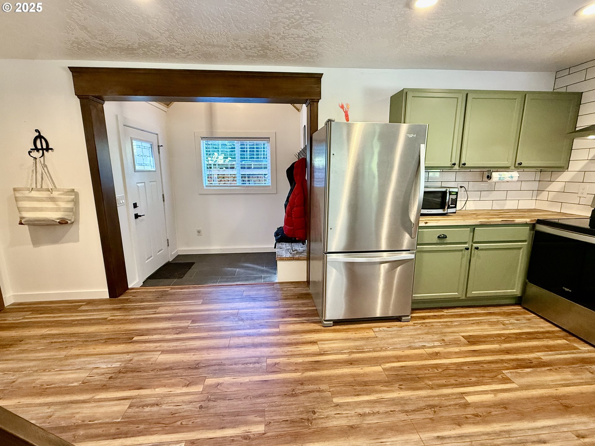 35349 Blitz Lane Blodgett, OR 97326 - Photo 14 of 47 a view of a kitchen with wooden floor and electronic appliances