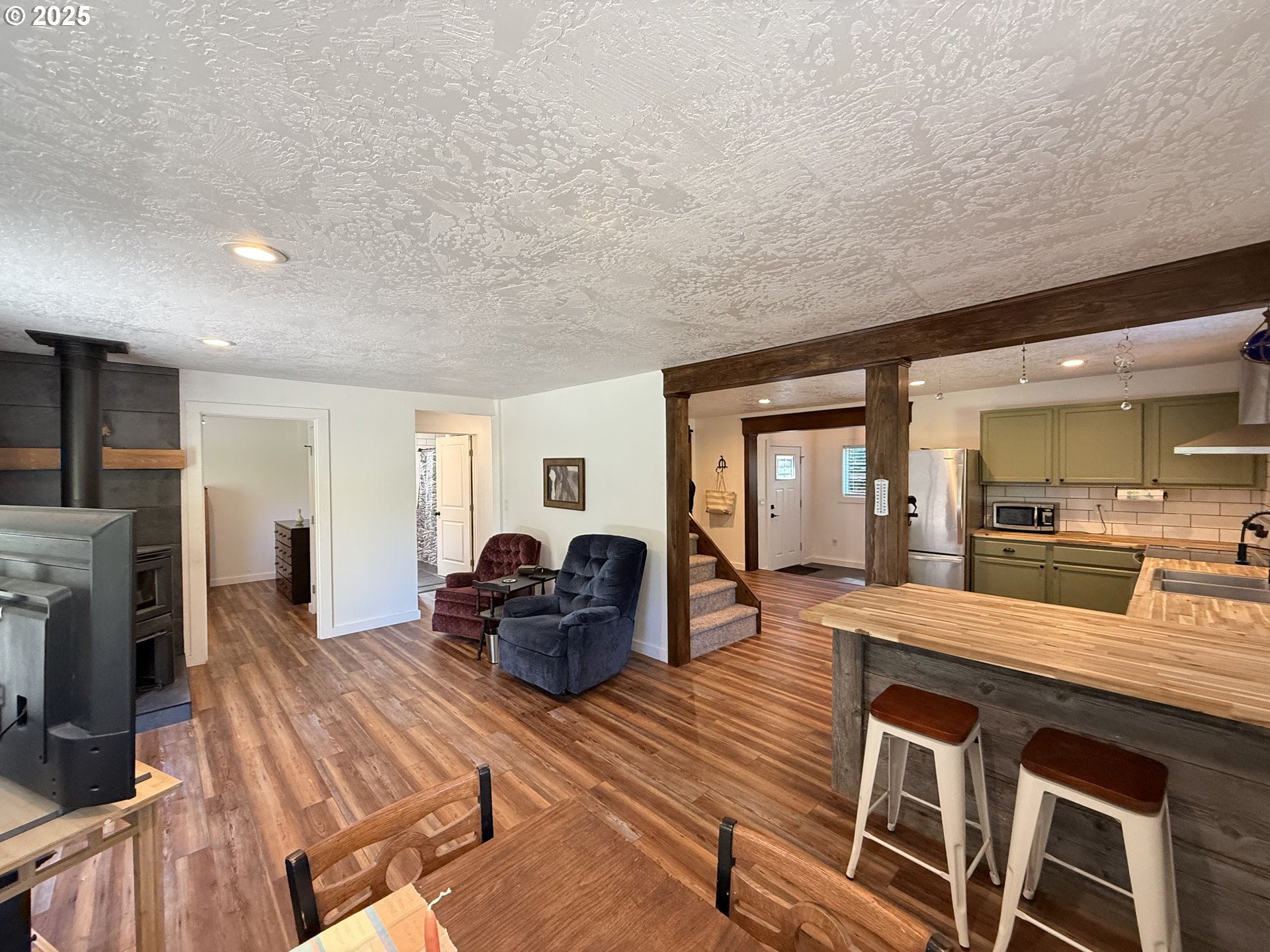 35349 Blitz Lane Blodgett, OR 97326 - Photo 20 of 47 a living room with furniture and fireplace