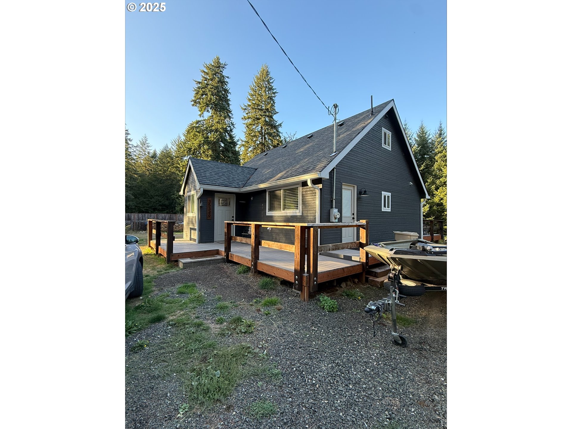 35349 Blitz Lane Blodgett, OR 97326 - Photo 2 of 47 a house view with a backyard space