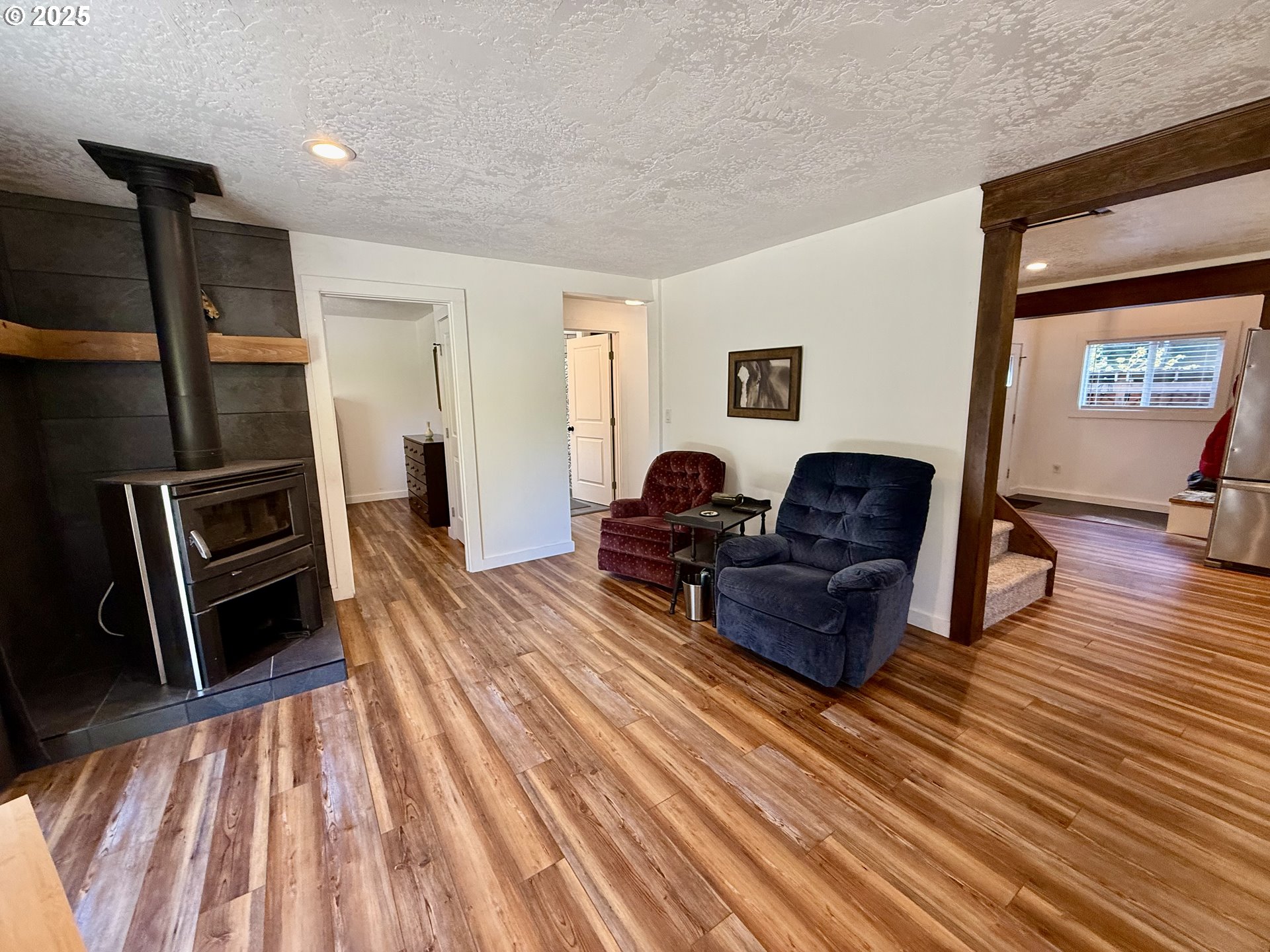 35349 Blitz Lane Blodgett, OR 97326 - Photo 21 of 47 a living room with furniture and a rug