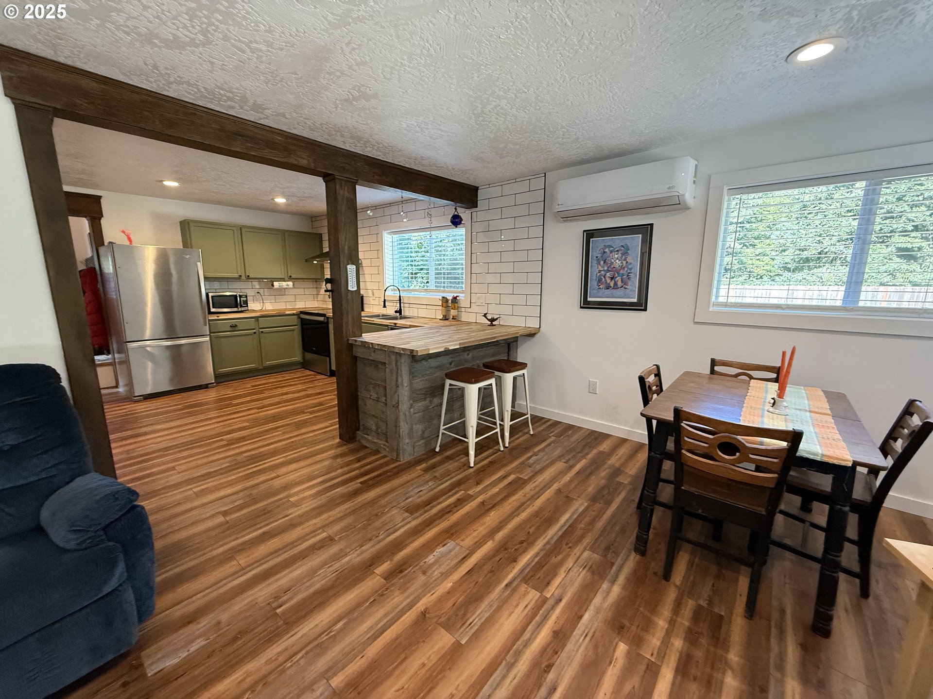 35349 Blitz Lane Blodgett, OR 97326 - Photo 22 of 47 a view of a dining room with furniture and wooden floor